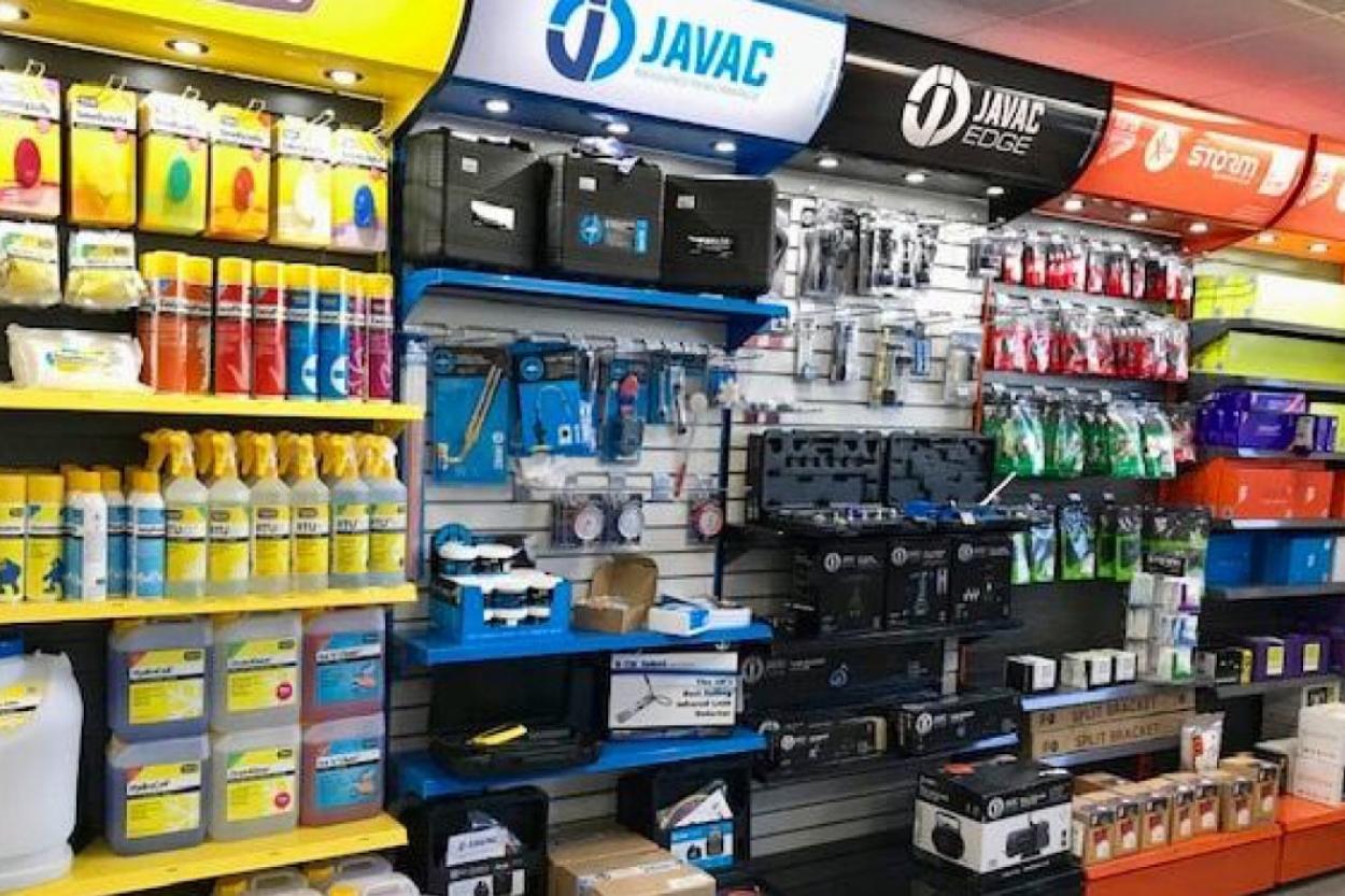 An image of a hardware store with shelves full of tools